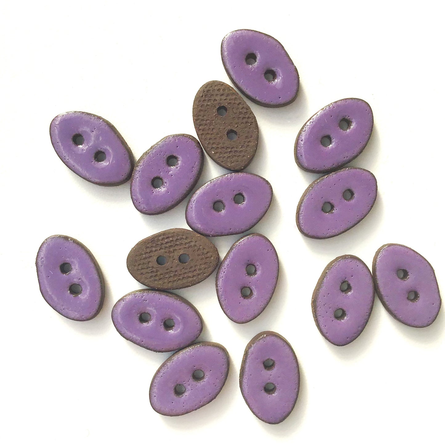 Purple Oval Clay Buttons on Black Clay - 1/2" x 3/4"