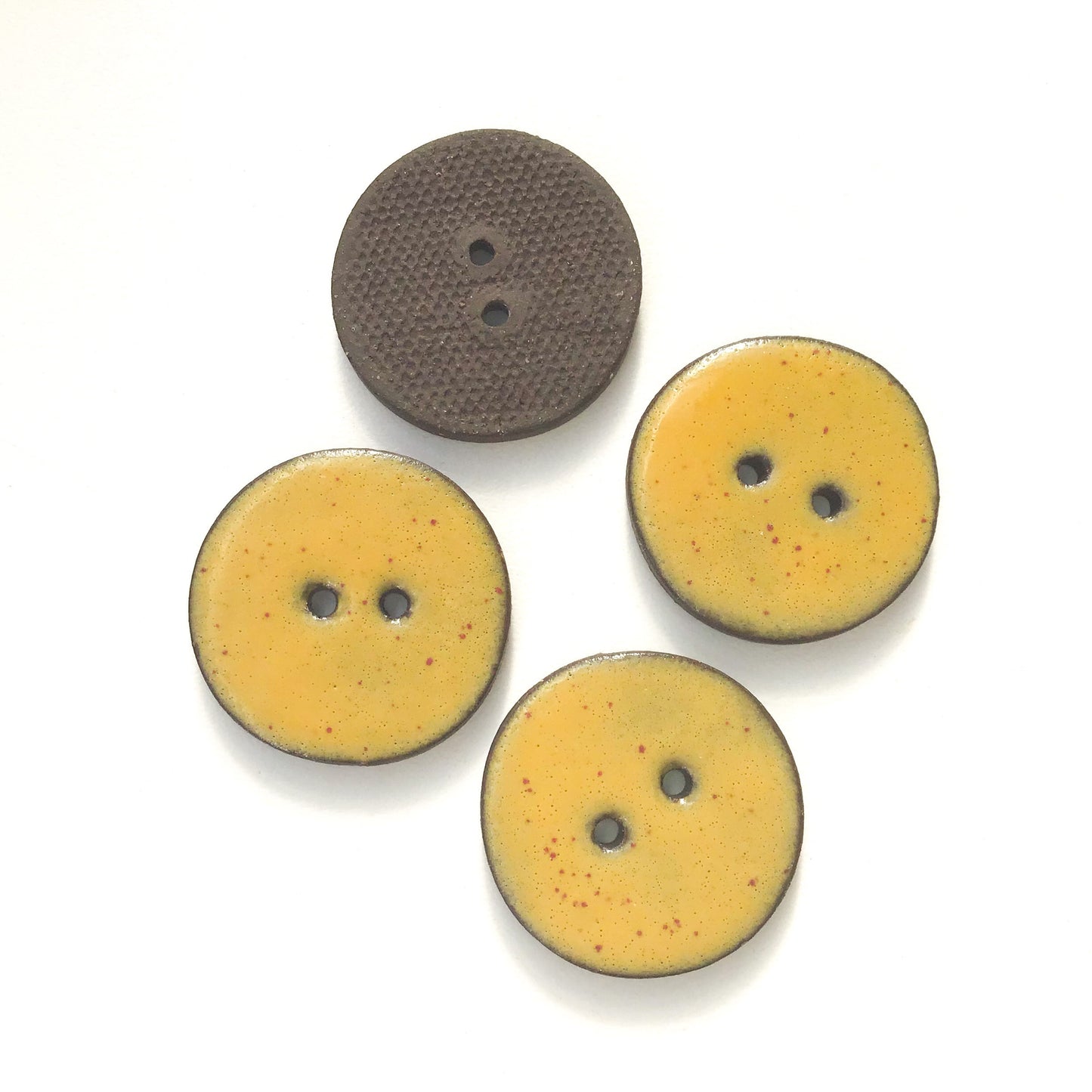 Speckled Mustard Brown Ceramic Buttons on Black Clay - 1 1/16"